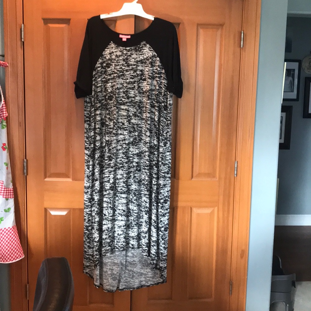Women within black and white maxi dress